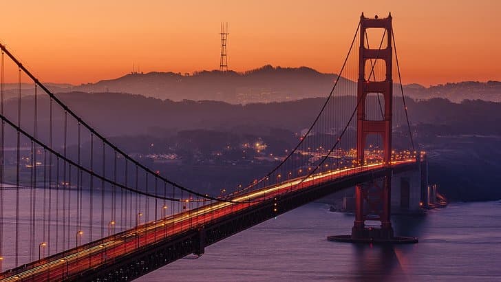 The Golden Gate Bridge at dusk, overlooking the San Francisco Bay.